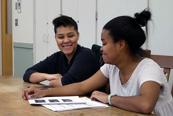 Writers and editors with Oblivion Magazine lead a workshop on coded language in the news. Photo by C. Azemar